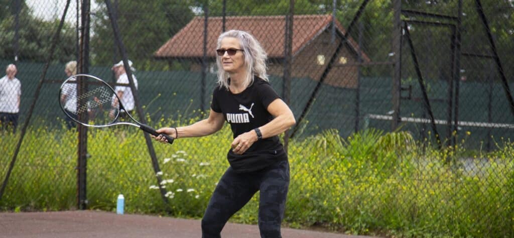 lady playing tennis in Valentines Park