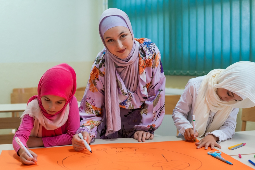 Islamic family taking part in Arts and Crafts